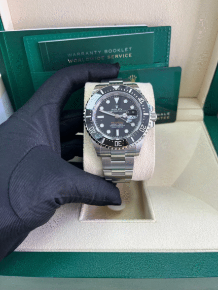 Super Clone Rolex Sea-Dweller 126600 50th Anniversary replica watch with red text, black dial, and ceramic bezel