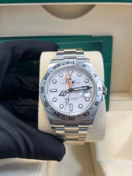 Rolex Explorer II 226570 replica with white dial, Oyster bracelet, and orange GMT hand