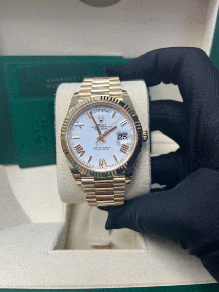 Super Clone Rolex Day-Date 228238 with yellow gold case, white Roman dial, and fluted bezel – 1:1 Swiss presidential replica