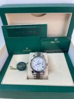 Super Clone Rolex Day-Date 228239 replica with white gold case, white Roman dial, fluted bezel, and President bracelet